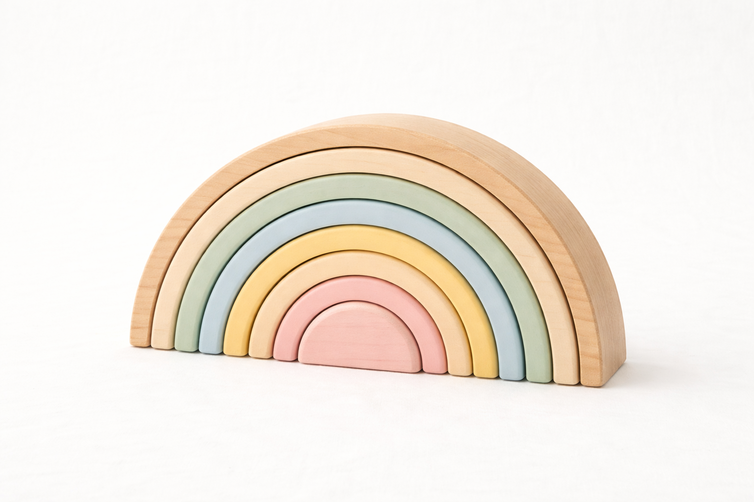 Naya Baby Montessori wooden rainbow stacker developmental toy natural wood white background