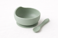 Naya Baby silicone suction bowl and spoon set BPA-free sage green white background