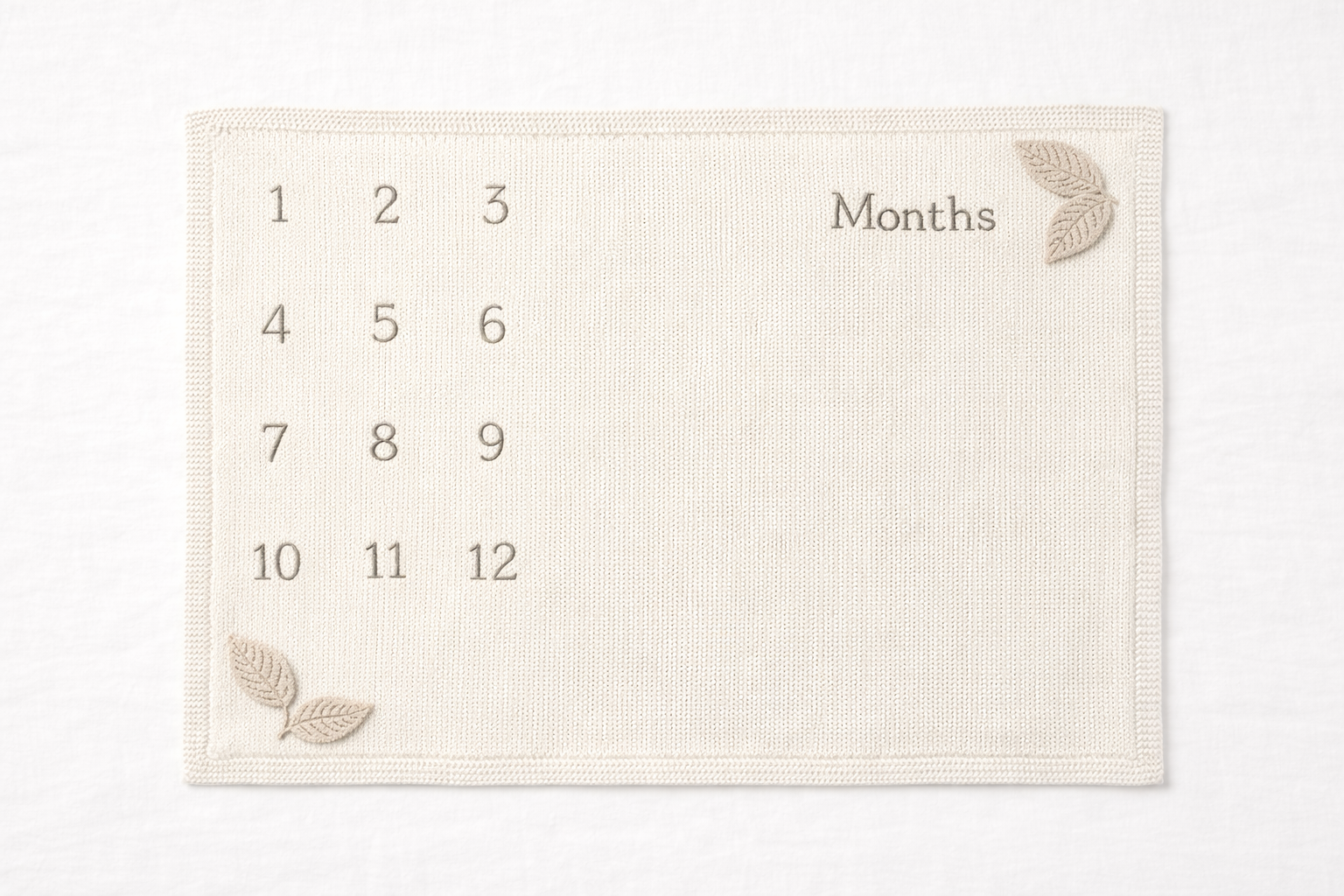 Naya Baby knitted monthly milestone blanket 1-12 months cream oat white linen flat lay