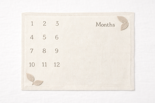 Naya Baby knitted monthly milestone blanket 1-12 months cream oat white linen flat lay