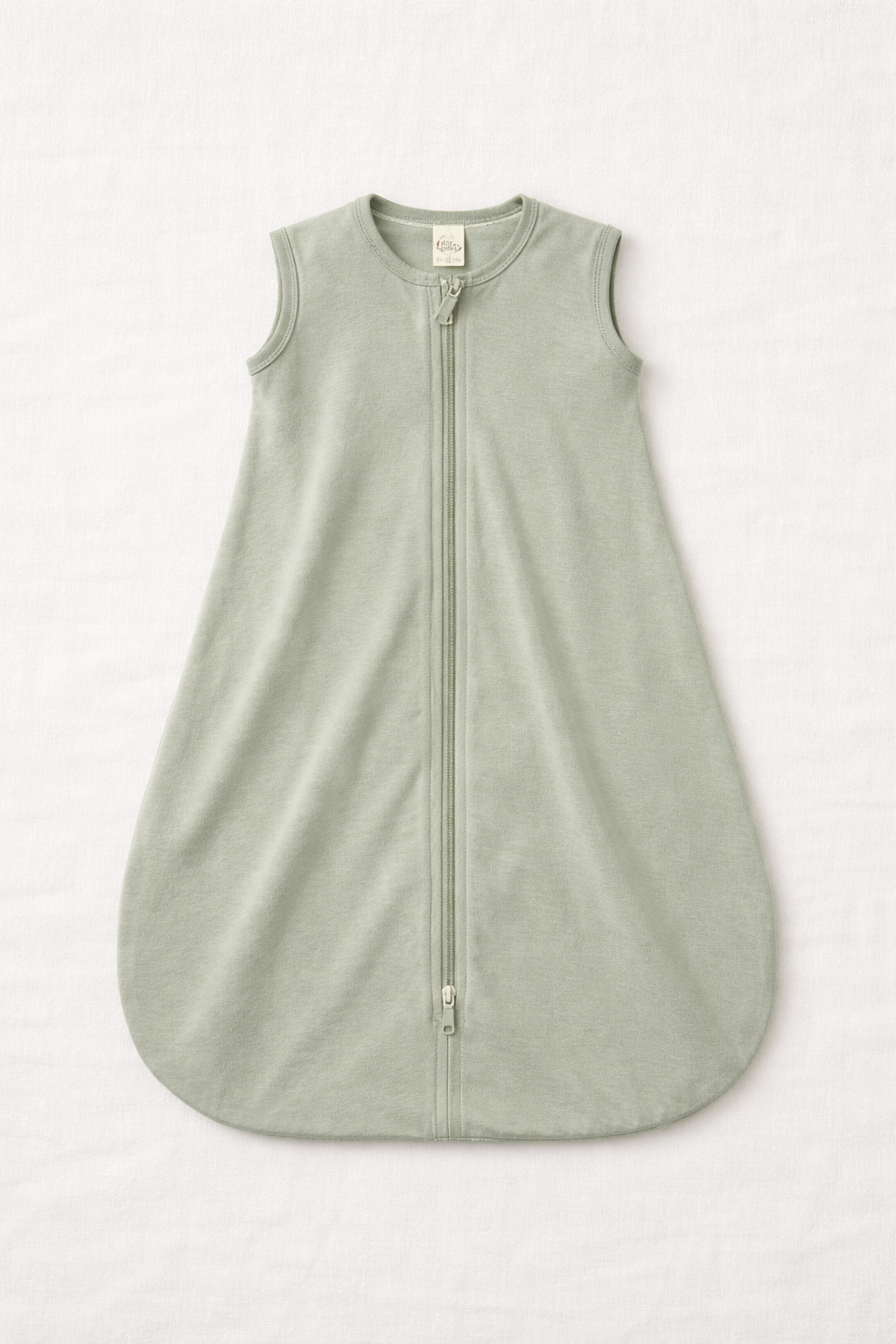 Naya Baby bamboo baby sleep sack 0.5 TOG sage green zip detail white linen flat lay